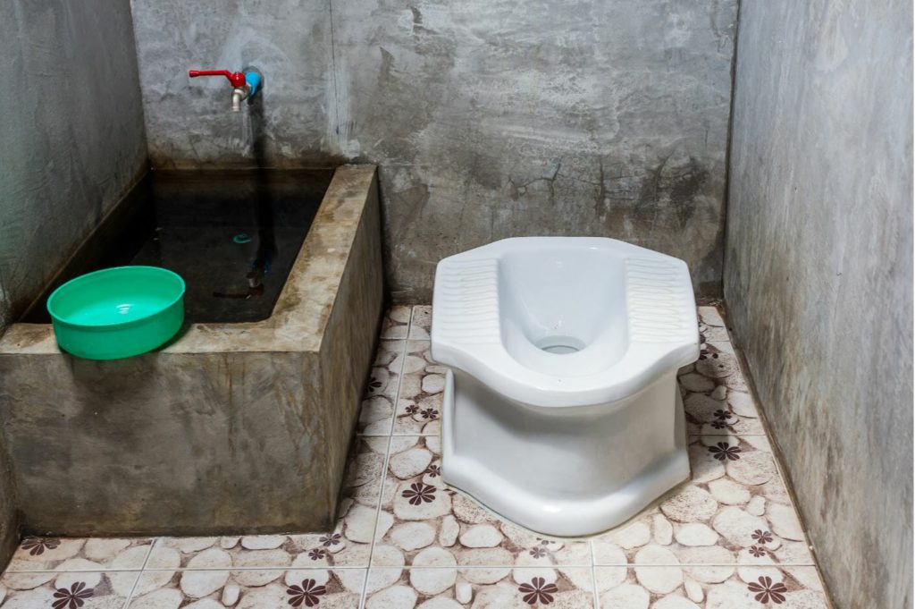 A squat style toilet in South-East Asia